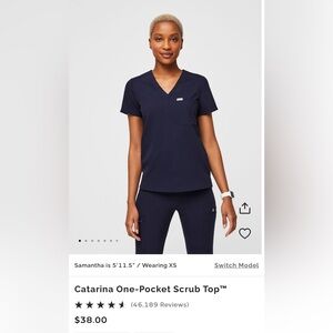 Catarina one pocket scrub top. Navy. Worn once. Like new condition. Size M.
